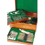 An oak cased silver plated harlequin canteen of cutlery for twelve place settings to include