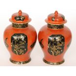 A pair of 1920s Wiltshaw and Robinson Carlton Ware Art Deco vase and covers decorated in the Kien