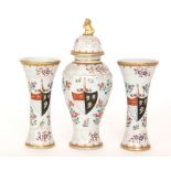 A late 19th to early 20th Century Edme Samson garniture comprising a vase and cover and a pair of