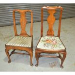 A Queen Anne style walnut standard chair with shaped baluster splat and slip in floral seat on