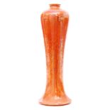 A large Ruskin Pottery Mei Ping vase decorated in an all over orange lustre, impressed marks,