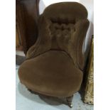 A Victorian ladies salon chair with button down dralon upholstery over turned front legs with
