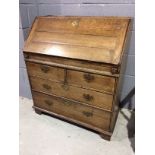 An 18th Century oak bureau,