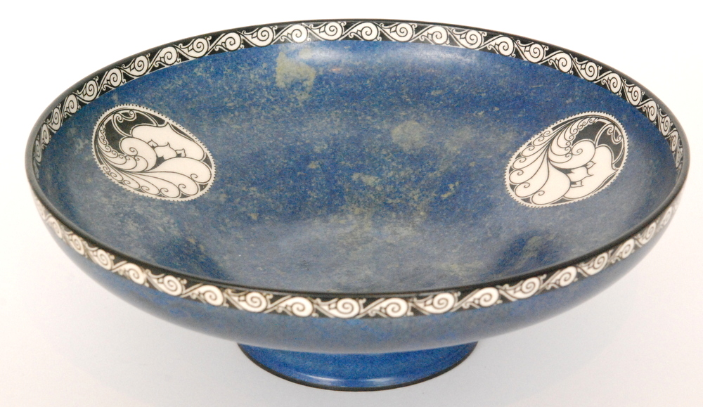 A 1920s Royal Worcester Crown Works footed bowl decorated in a mottled blue green with black and