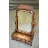 A small 18th Century style feather banded walnut dressing table mirror on bun feet,