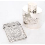 A hallmarked silver rectangular card case with engraved foliate decoration, with an oval tea caddy,