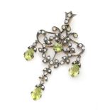 An Edwardian style peridot and seed pearl pendant,