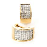 A pair of 18ct hallmarked diamond cluster earring each comprising five rows of nine square cut