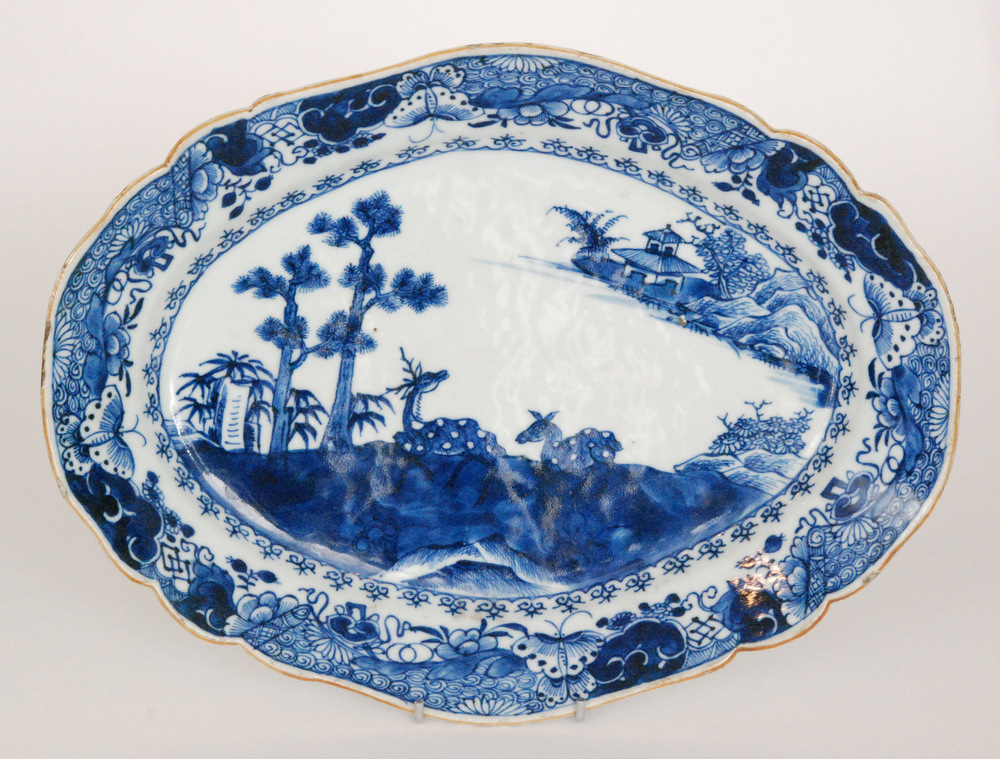 A 19th Century Chinese oval dish decorated with two deer sat in a Chinoiserie landscape, - Image 2 of 3