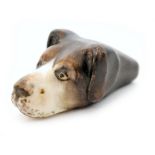 A Royal Worcester whistle modelled as the head of a dog with painted features, puce mark,