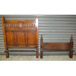 Two sets of 18th Century style carved oak single bed ends, each with lunette decorated panels,