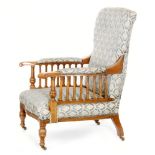 An Arts and Crafts oak library armchair in the manner of Morris & Co,