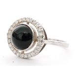 An Art Deco style 9ct white gold black onyx and diamond cluster ring,
