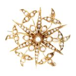 An early 20th Century 15ct seed pearl set star shaped pendant/brooch, diameter 3.5cm, weight 8.