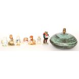 A small collection of assorted figurines comprising two Hummel Goebel figures,