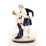 A Royal Dux Art Deco figure modelled as two dancers in Arabic dress,