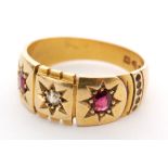 An early 20th Century 18ct hallmarked ruby and diamond three stone ring,