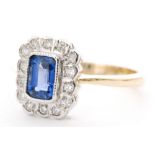 An 18ct hallmarked sapphire and diamond cluster ring,