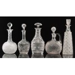 A 20th Century clear crystal glass claret jug of compressed globe and shaft form with applied