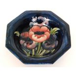 A William Moorcroft octagonal bowl decorated in the Big Poppy pattern with three tubelined flowers