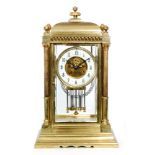 An early 20th Century brass mantle clock of classical form,