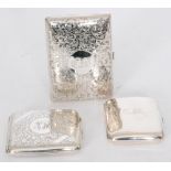 Two hallmarked silver cushioned rectangular cigarette cases with a similar cigar case,