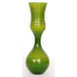 A later 20th Century Italian glass vase of globe form below a tall waisted neck decorated with