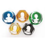 A group of five 20th Century Baccarat glass paperweights each with a central sulphide portrait,