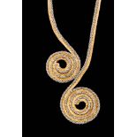 A 1970s 18ct white and yellow gold scrolled figure of eight necklet designed as two lengths of