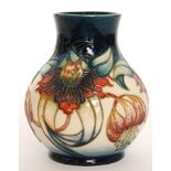 A Moorcroft Pottery baluster vase decorated in the Anna Lily pattern designed by Nicola Slaney,