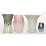 A group of four 20th Century Vasart glass vases comprising a footed flared form example in pale