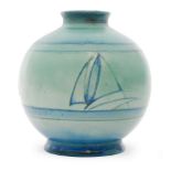 A small 1930s William Moorcroft footed ovoid vase decorated in the salt glaze Yacht pattern with