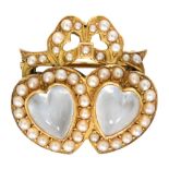 An early 20th Century moonstone and seed pearl double heart sweetheart brooch,