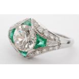 An Art Deco style 18ct white gold emerald and diamond ring,