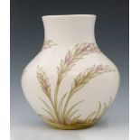 A 1930s William Moorcroft vase of compressed baluster form decorated in the salt glazed Waving Corn