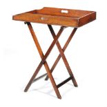 A 19th Century mahogany butlers tray and folding stand,