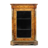 A late 19th Century French marquetry inlaid figured walnut pier cabinet,