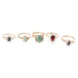 Four 9ct hallmarked stone set cluster rings,