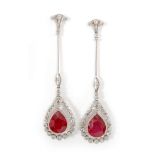 A pair of Art Deco style 18ct white gold ruby and diamond pendant earrings,