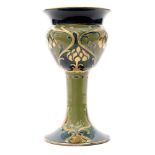 An early 20th Century William Moorcroft for James Macintyre & Co chalice vase with a flared foot