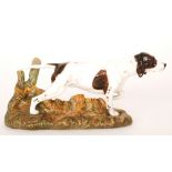 A Royal Doulton model of a Pointer dog on a moulded fern undergrowth base,