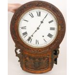 A late Victorian oak cased drop dial circular wall clock,