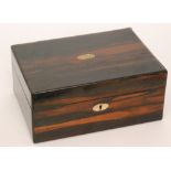 A 19th Century coromandel sewing box with compartmental interior,