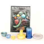 A small collection of assorted Ruskin Pottery comprising a yellow lustre vase,