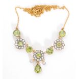 A silver gilt Edwardian style peridot,