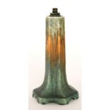 A Ruskin Pottery lamp base of hexagonal form glazed in a mottled blue to orange to green,