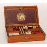 A late Victorian mahogany cased games compendium for chess, draughts and escalado, S/D.