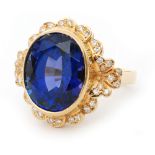 A modern 18ct tanzanite and diamond ring,