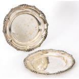 A pair of hallmarked silver plates of circular outline with gadroon border, total weight 49oz,