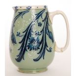 An early 20th Century William Moorcroft for Macintyre & Co Dura Ware water jug decorated with a